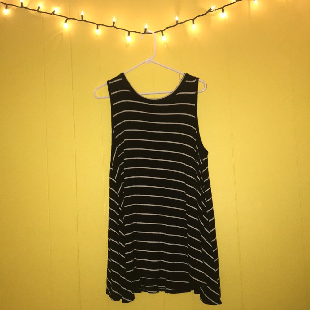 It is a long, striped, black and white tank top